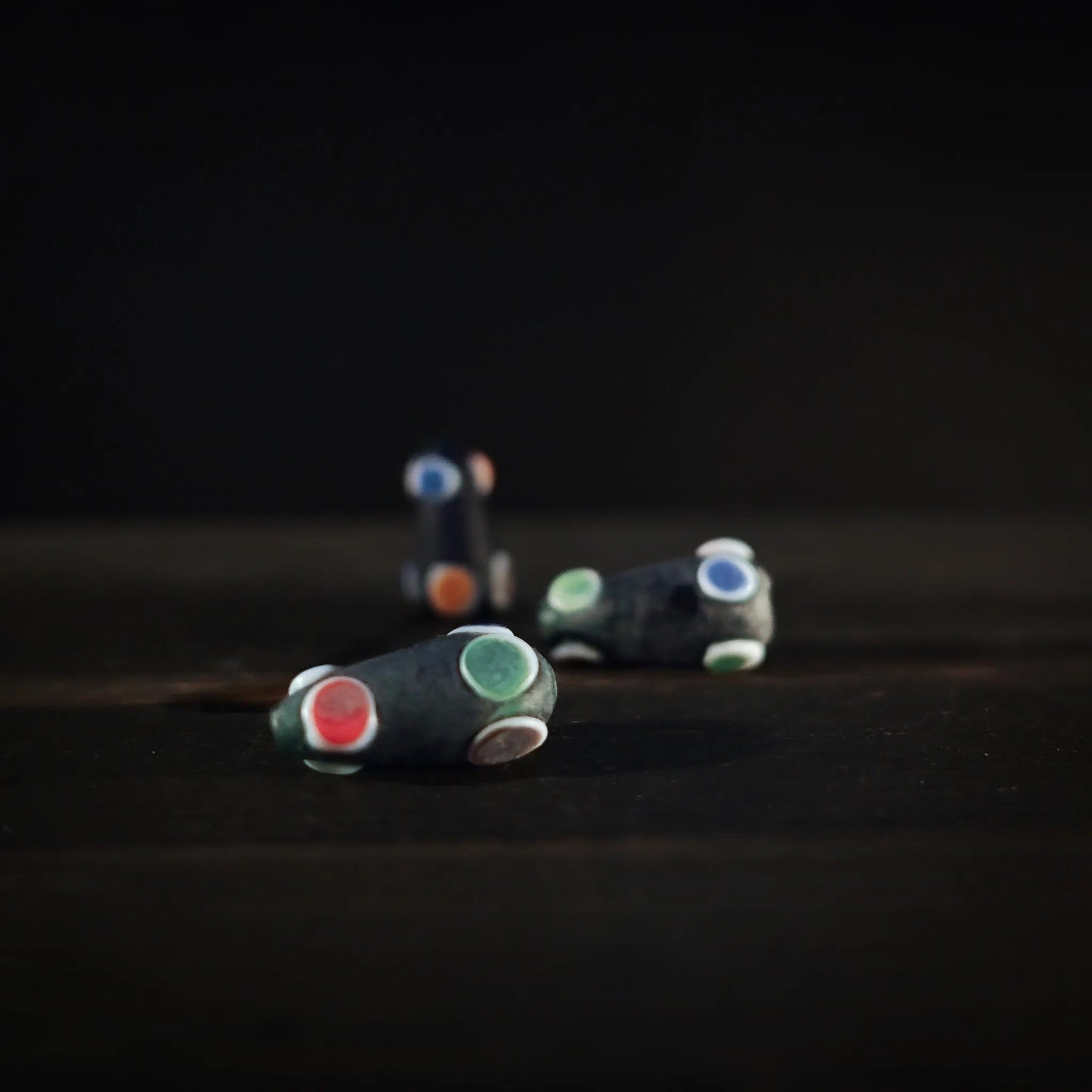 Bottle green bead with dots