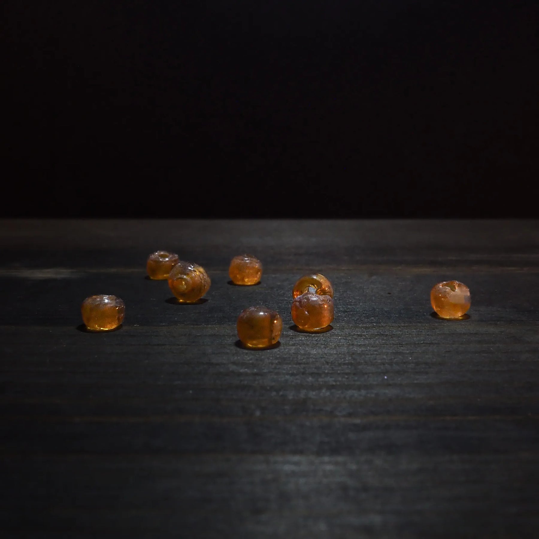 Round orange glass bead