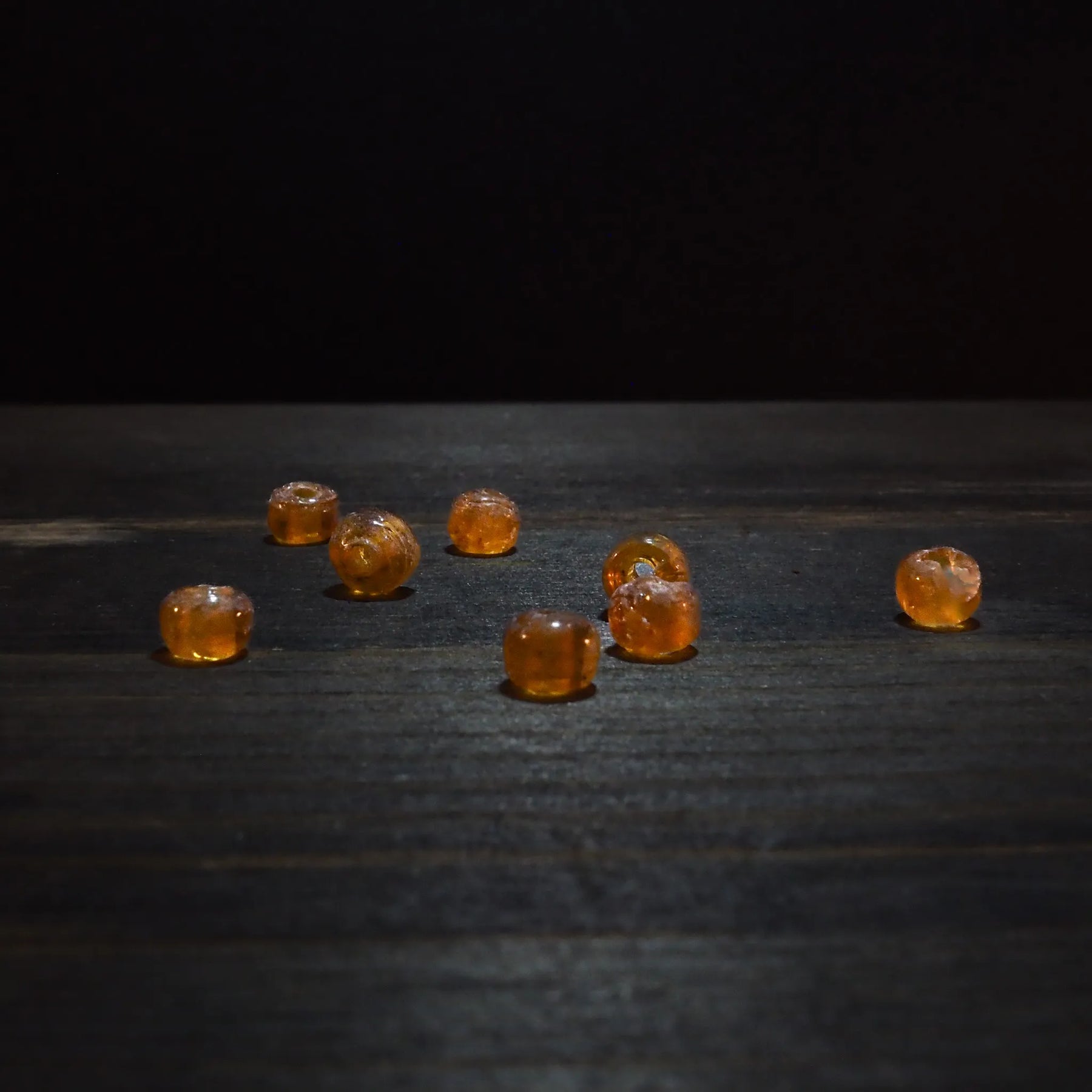 Round orange glass bead