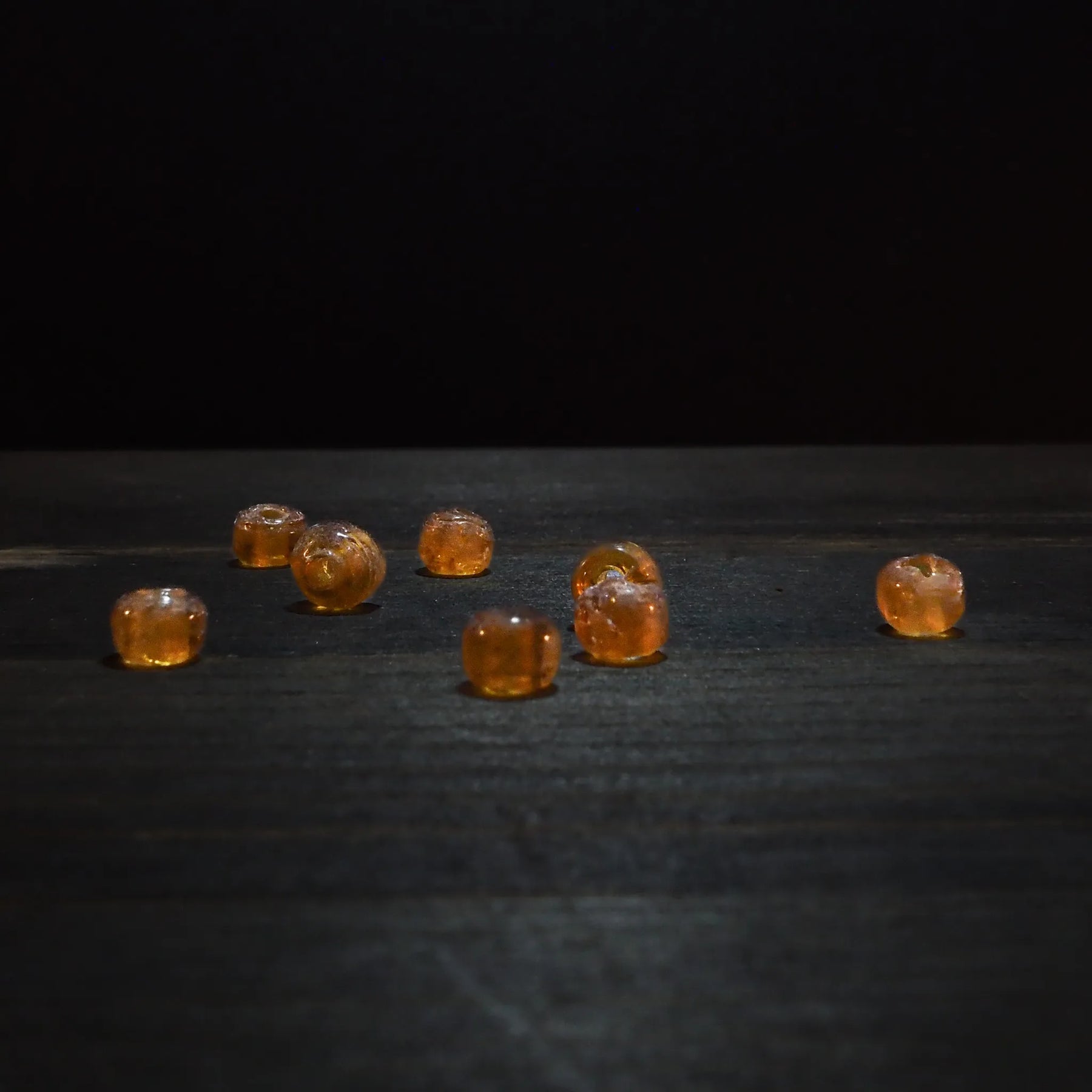 Round orange glass bead