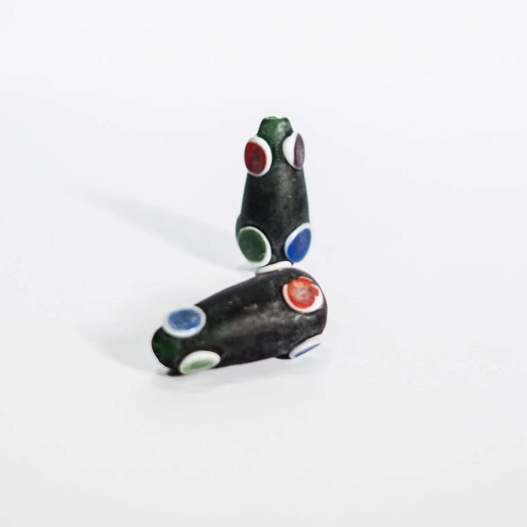 Bottle green bead with dots