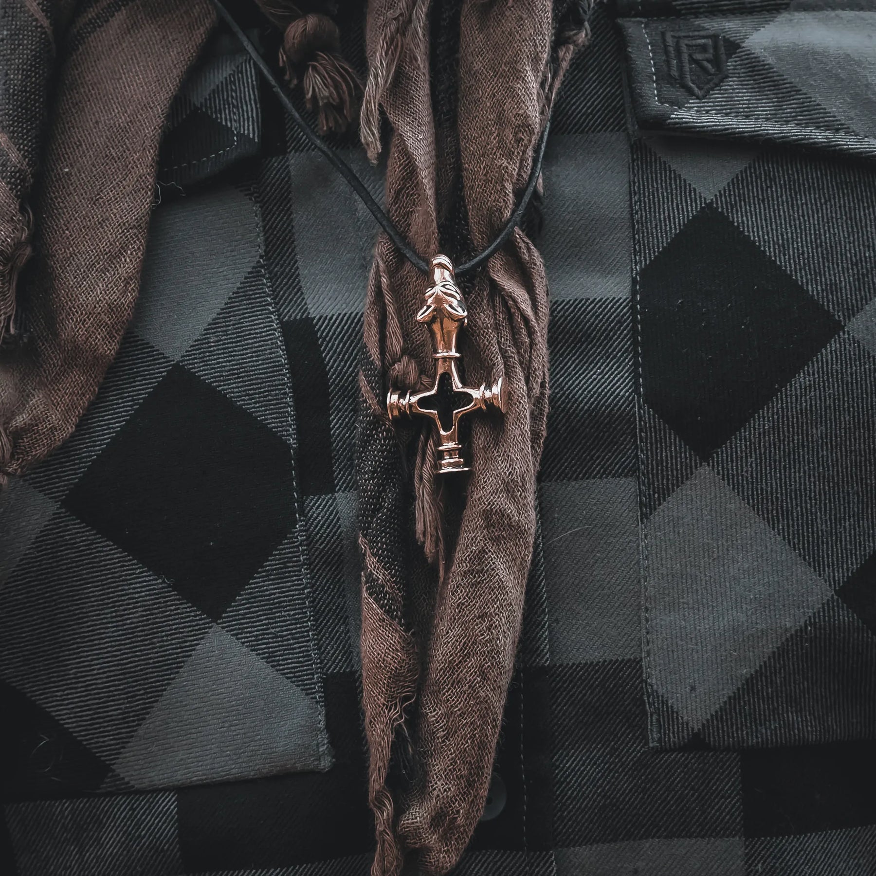 Wolf cross in brass