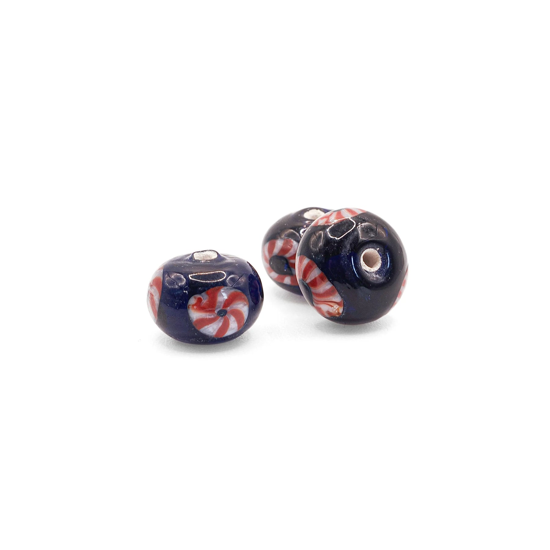 Blue glass bead with red-white eye