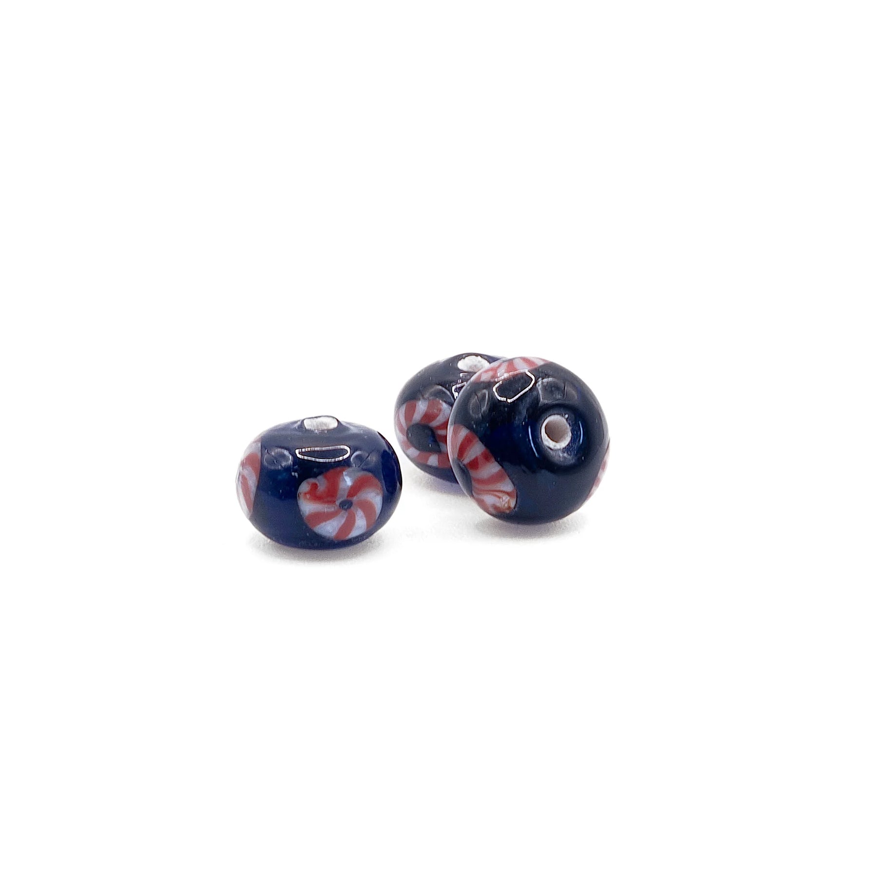 Blue glass bead with red-white eye
