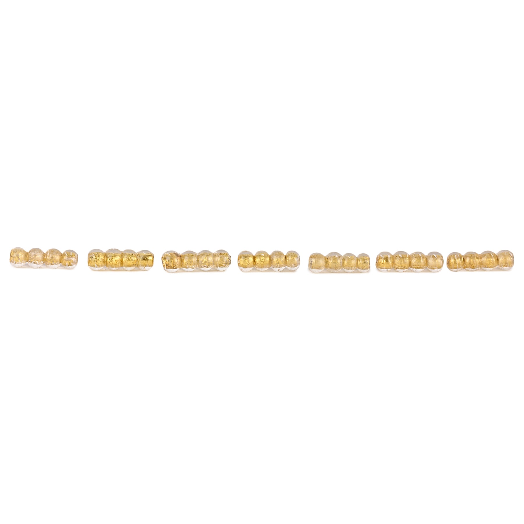 Glass bead with leaf gold