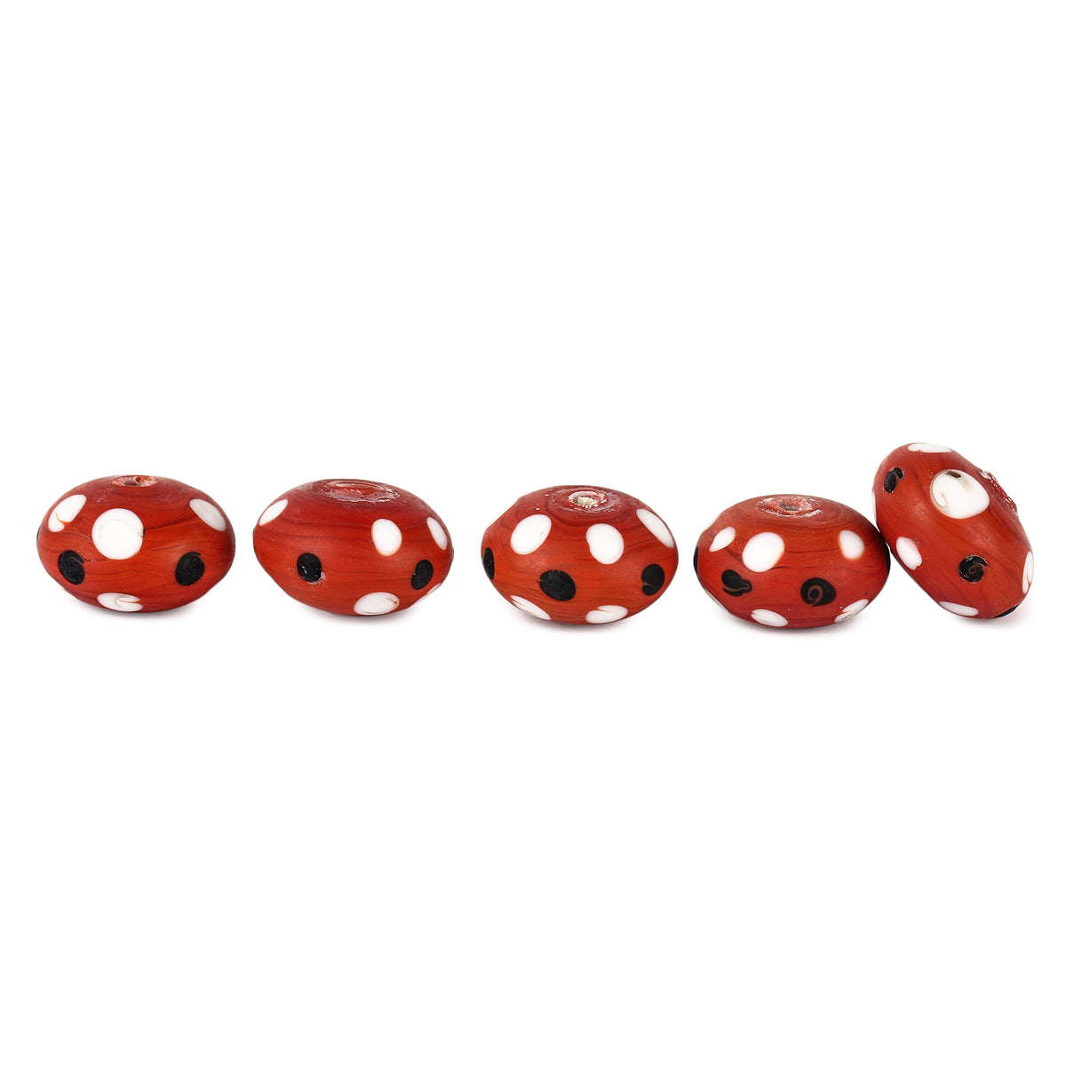 Red glass bead with dots