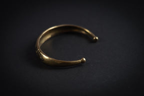 Curved bracelet with decoration