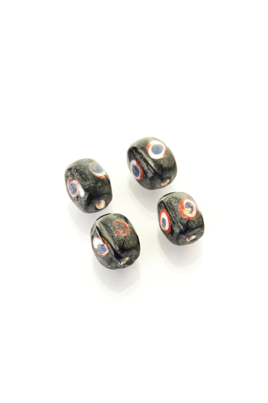 Blue glass bead with eye decoration