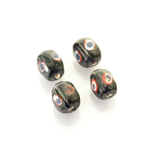 Blue glass bead with eye decoration