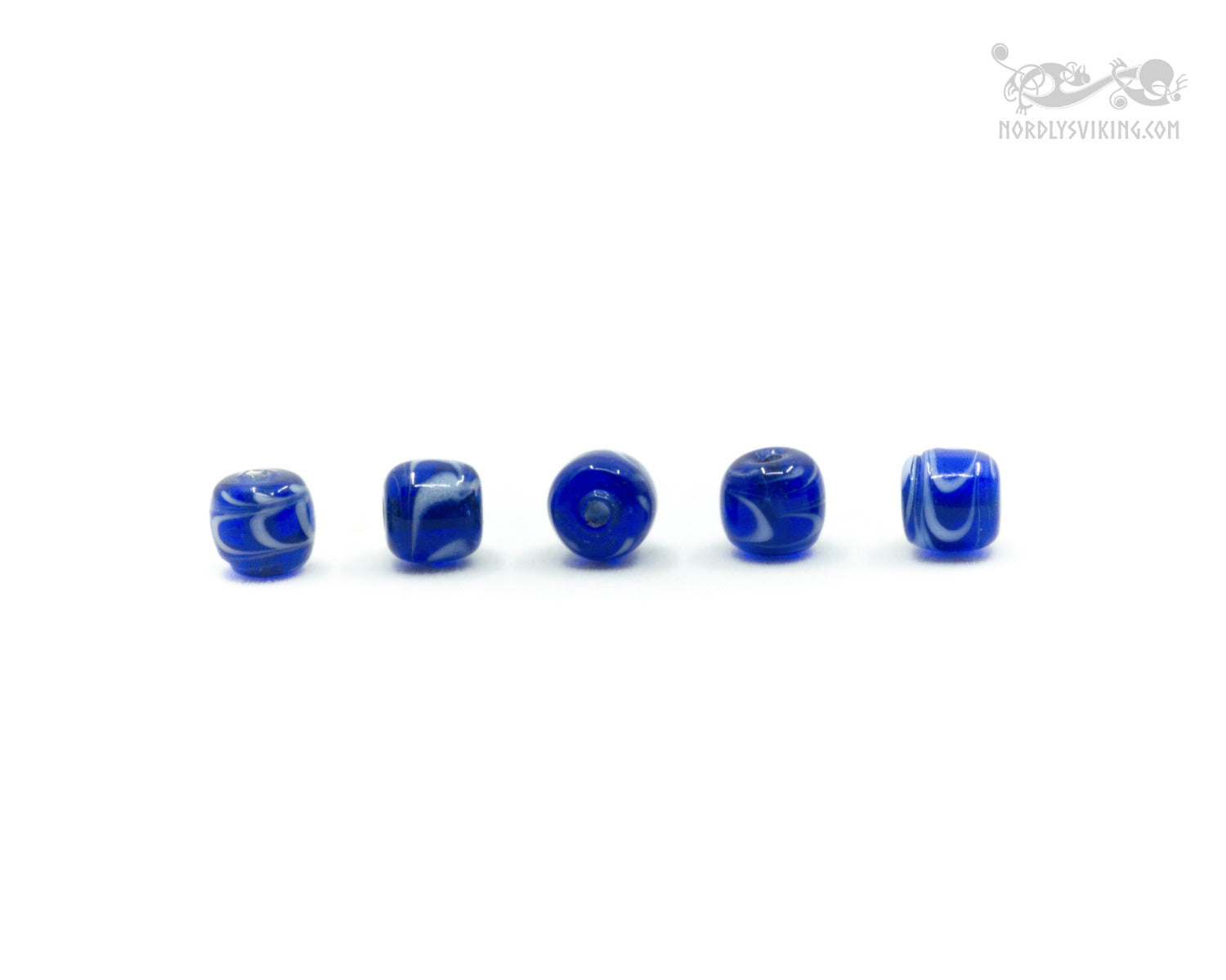 Blue shiny glass bead with decoration