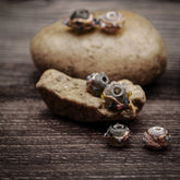 Festlig liten glaspärla