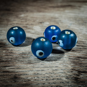 Blue round glass bead from Birka, matte