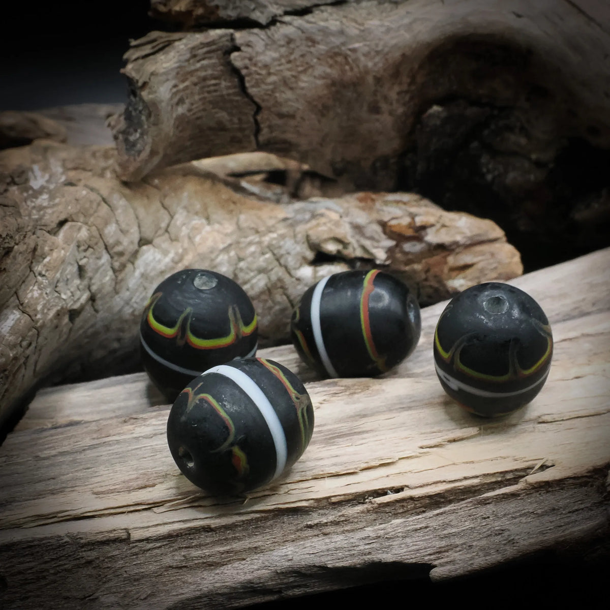 Black glass bead with decoration, Gotland