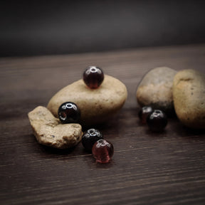 Dovt lila glaspärla