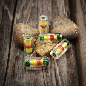 Färgglad glaspärla