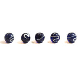Glass bead, blue with white decoration.
