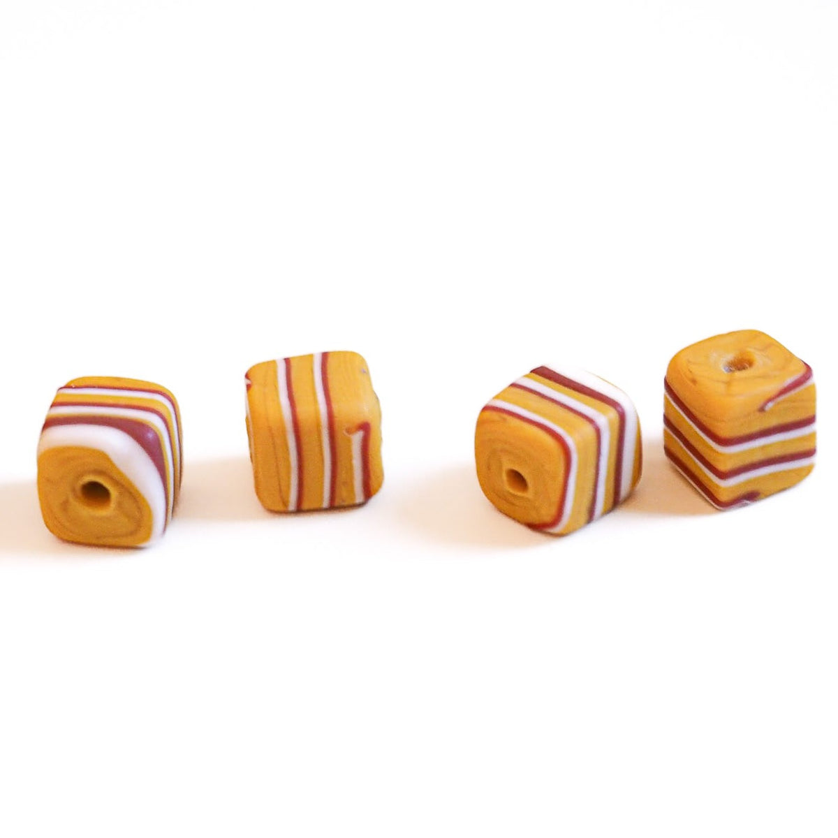 Glass bead, cube, matte, yellow with red and white stripes