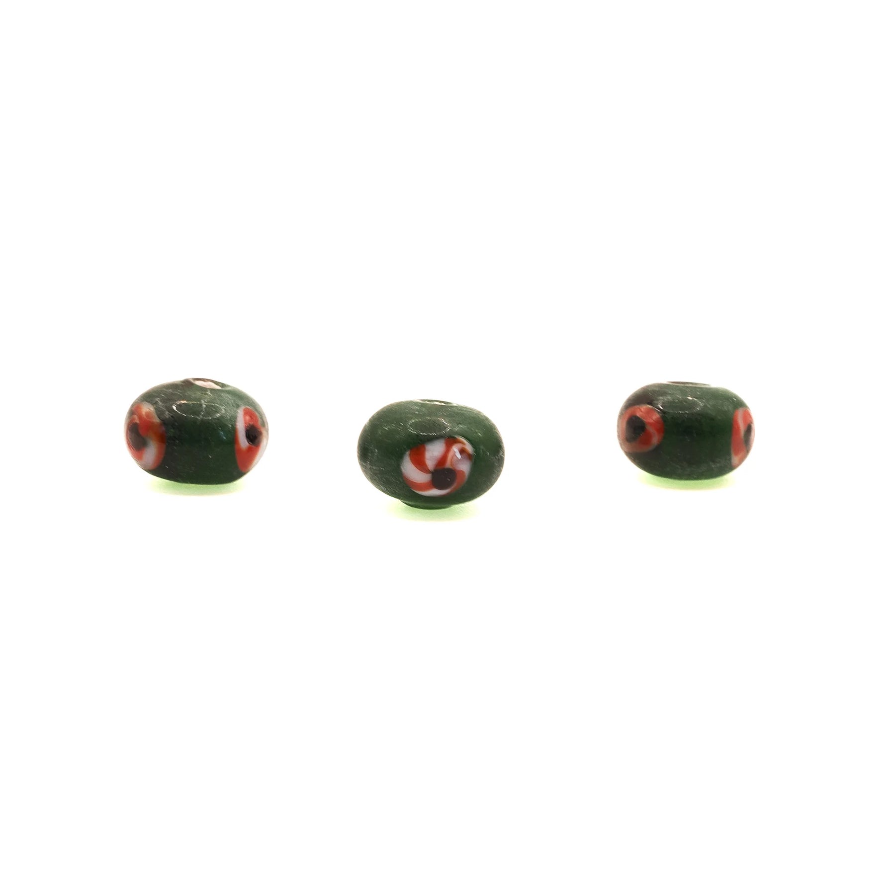 Green glass bead with red-white eye