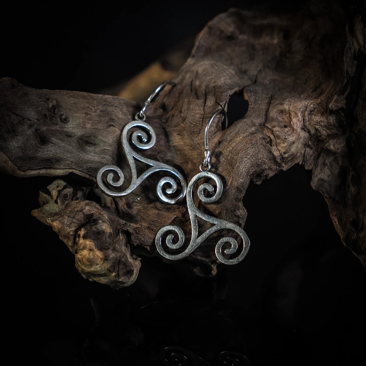 Brass triskele earrings