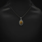 Charm with semi-precious stone