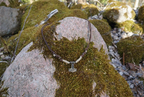 Nordlys Thors hammer in a beautiful bronze finish. Ready made necklace with adjustable size.