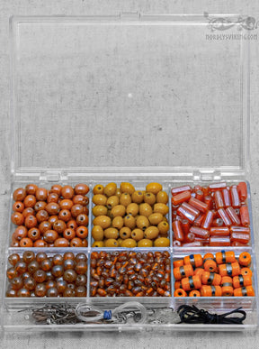 Pärllåda med orangea pärlor