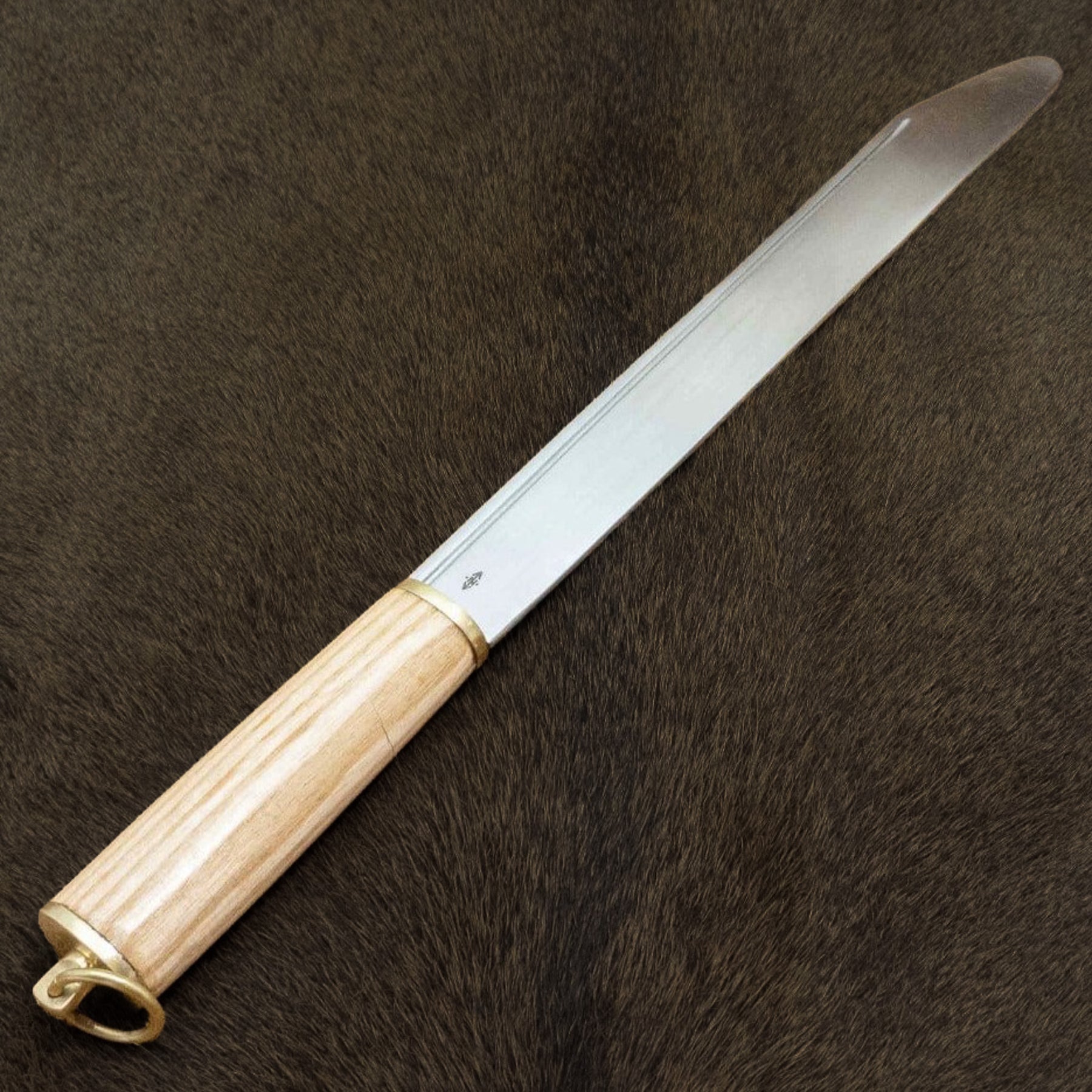 Vikinga sax, brittiska öarna. Bluntad egg.
