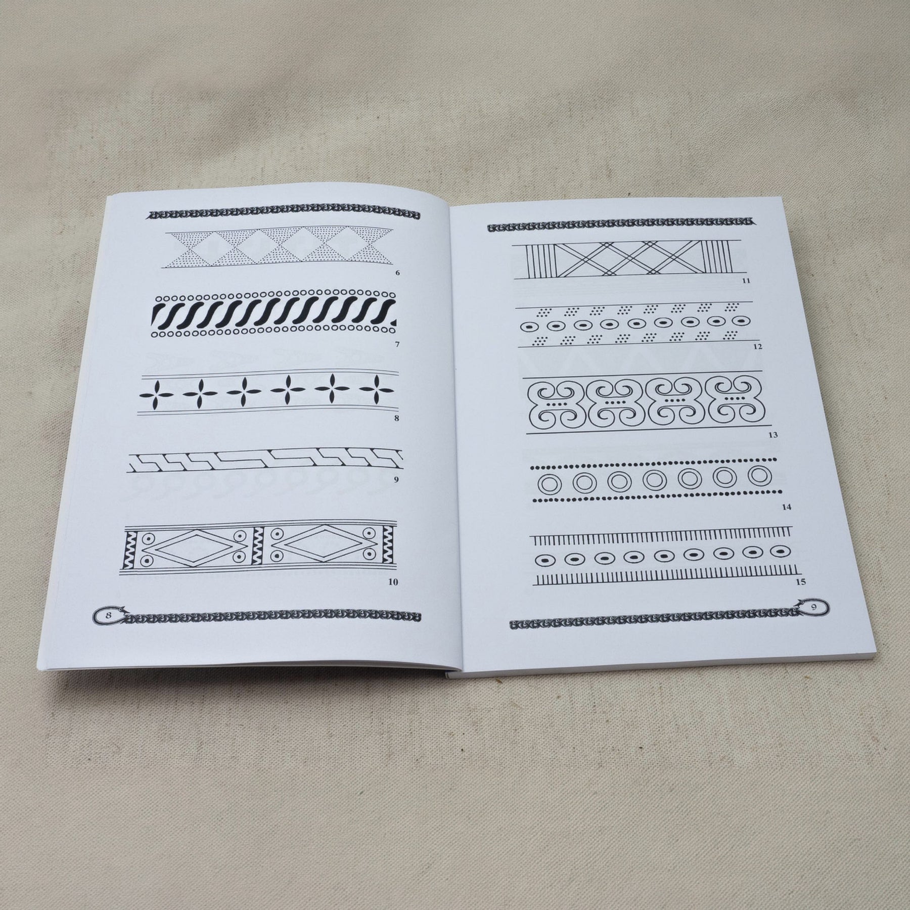 Vendel and Dark Age Vol. 4 – spread with numbered border patterns in black and white