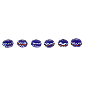 Blue glass bead with twisted decor