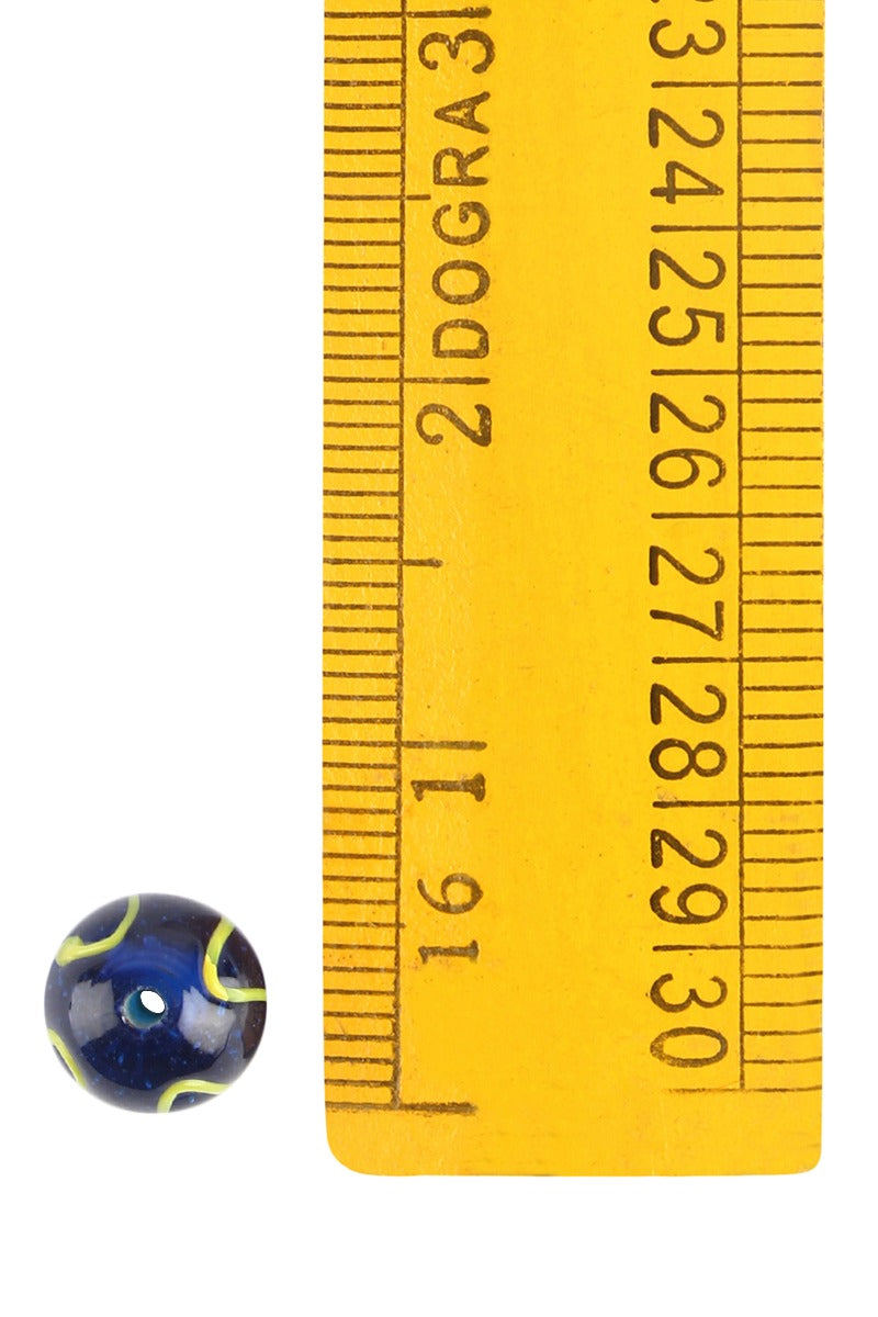 Blue glass bead with yellow decor