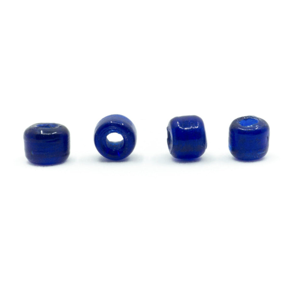 Blue glass bead, square – four beads in a row, clear cube shape