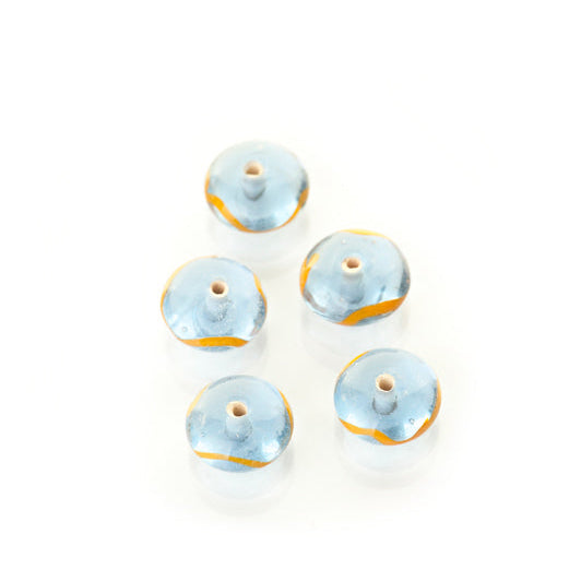 Blue glass bead with decoration