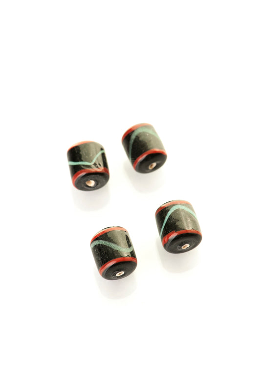 Black glass bead with green / red decor