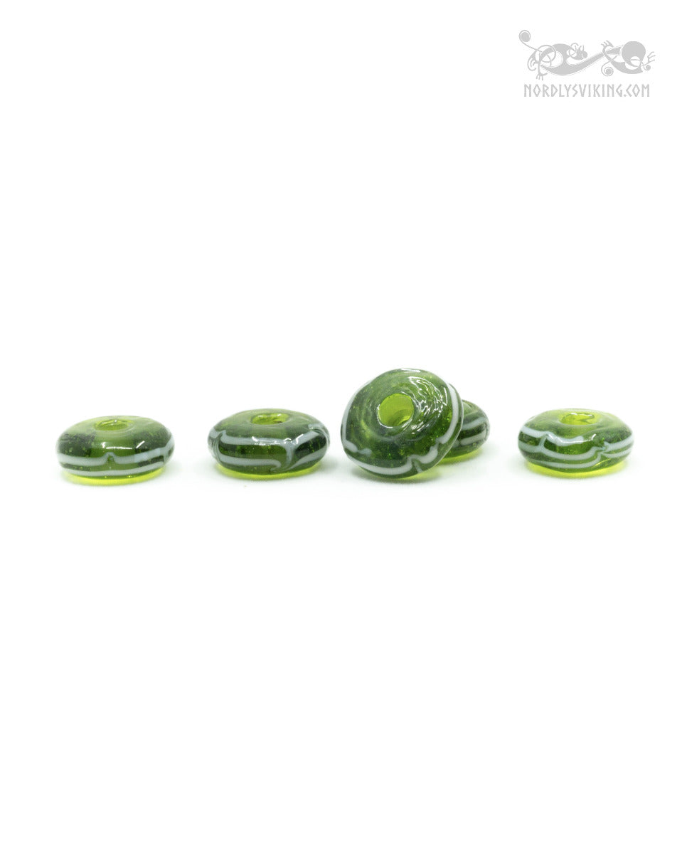 Green shiny glass bead with decoration