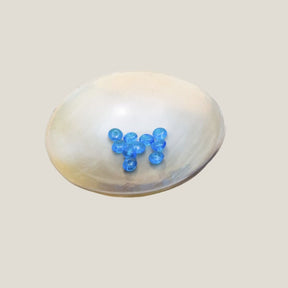 Small shiny blue glass beads